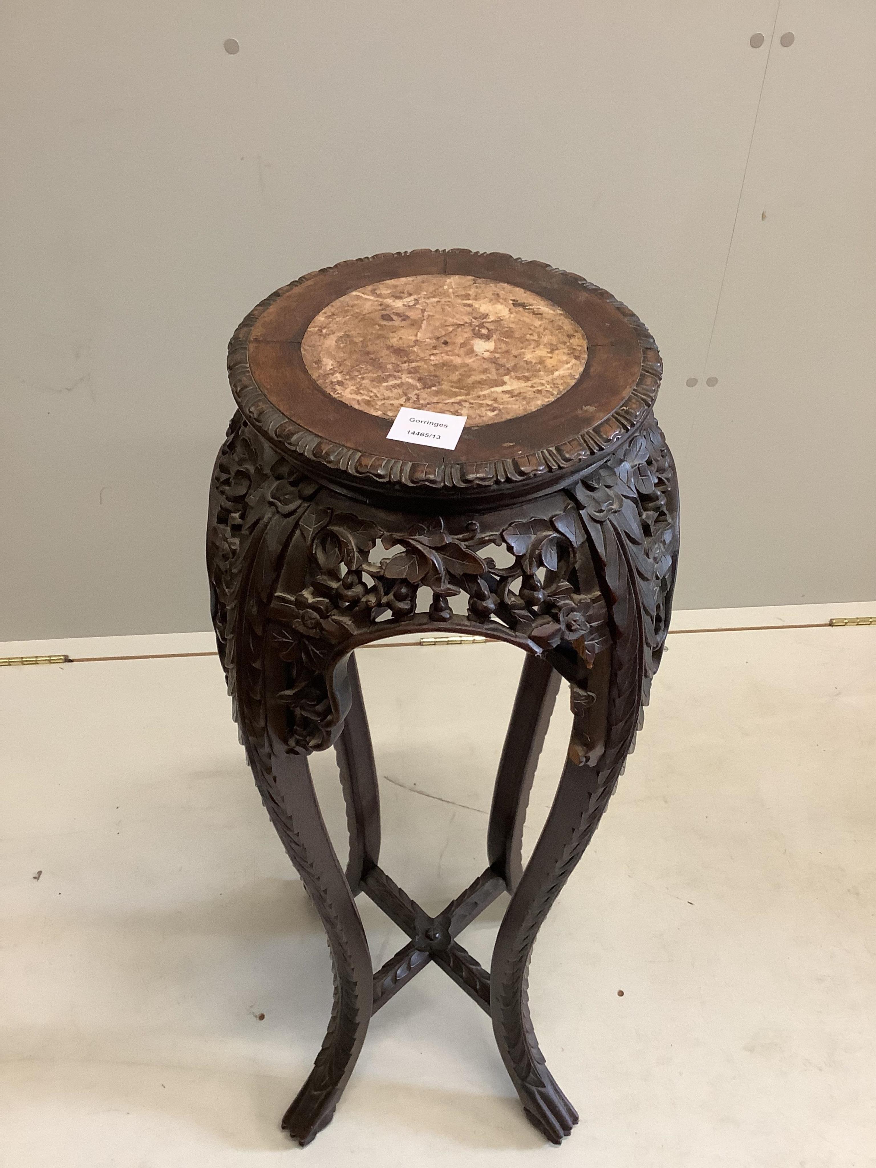A Chinese hongmu and marble jardiniere stand, height 90cm. Condition - poor